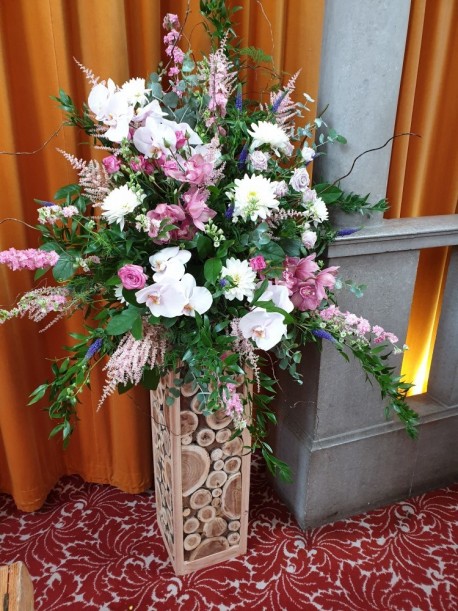 Floral arrangement by Blossom Flowers