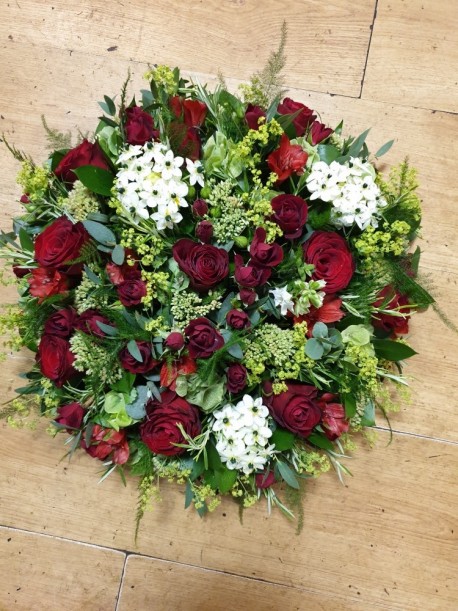 Floral arrangement by Blossom Flowers