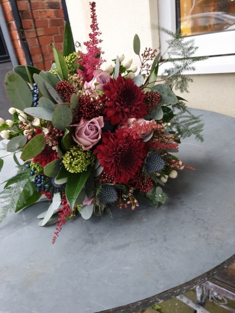Floral arrangement by Blossom Flowers