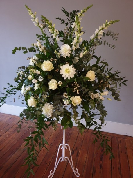Floral arrangement by Blossom Flowers