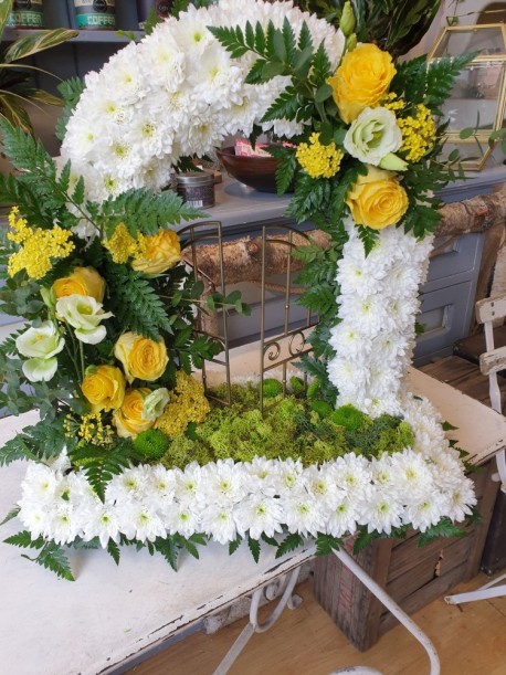 Floral arrangement by Blossom Flowers