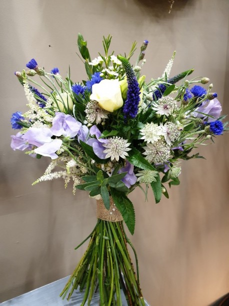 Floral arrangement by Blossom Flowers